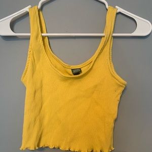 yellow ruffled tank